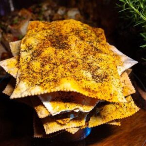 Placa de Crostinis com Cajun Spice e Tomilho